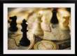 Chess pieces on old world map