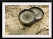 Antique compass on map
